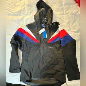 Adidas black pull over with red blue and white stripes